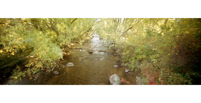 Drainage Ditch, 2008. Pinhole Camera, Color Film, Pigment Inkjet Print, 12x36